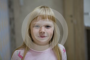 Little girl at home smiling