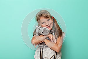 Little girl hugging her favourite toy