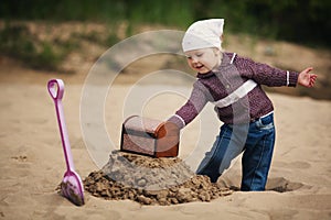 Little girl hunting for treasure