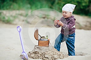 Little girl hunting for treasure