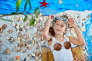 Little girl imitates Havaii vacation at home quarantine.