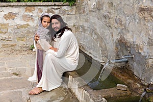 Little girl and Jesus at the water well