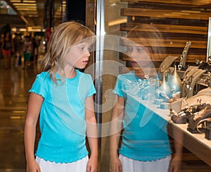 Little girl at jewelry store.