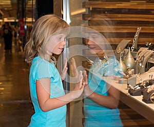 Little girl at jewelry store.