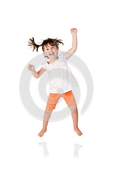Little girl jumping photo