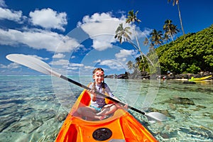 Little girl in kayak