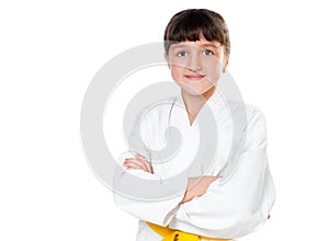 Little girl in a kimono with a yellow sash