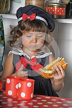 Little girl in the kitchen