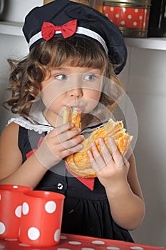 Little girl in the kitchen