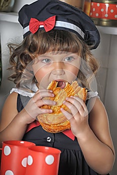 Little girl in the kitchen