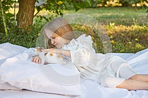 Little girl with kitten