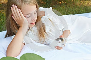 Little girl with kitten