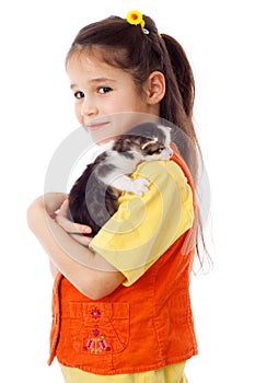 Little girl with kitty on shoulder