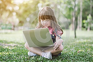 Little girl with laptop