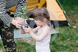 Little girl learn how to be photographer, nature