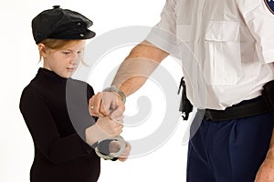 Little girl is learning how to arrest a person