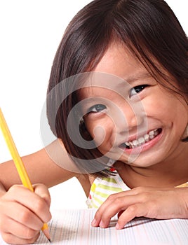 Little girl learning to write