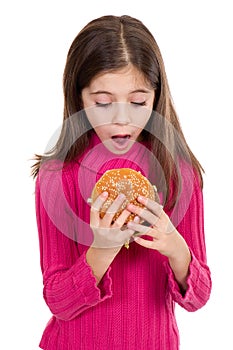 Little girl looking hamburger