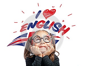 Little girl looking at i love english text and UK flag above her head