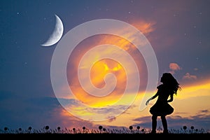 Little girl looking the moon