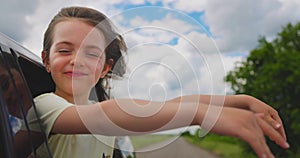 Little girl looking out of car window and enjoy family travel in nature, summer vacation and road trip to the beach