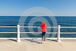 Little girl looking the sea