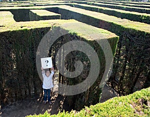 Little girl lost on a maze