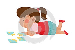 Little Girl Lying and Putting Together Jigsaw Puzzle Vector Illustration