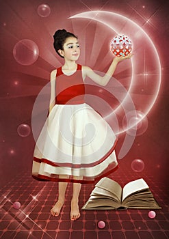 Little girl with a magic ball in her hand