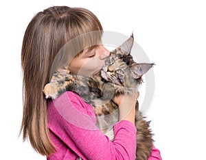 Little girl with Maine Coon kitten