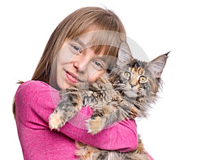 Little girl with Maine Coon kitten