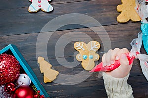 little girl making christmas cookies
