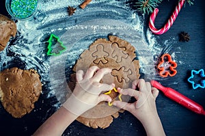 Little girl making Christmas cookies