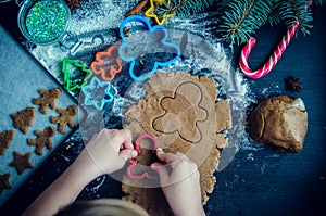 Little girl making Christmas cookies