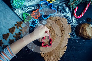 Little girl making Christmas cookies