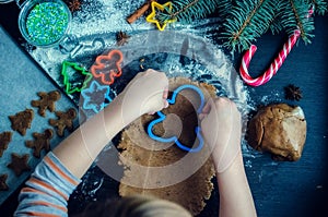 Little girl making Christmas cookies