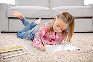 Little girl making homework