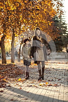 Little girl with mather outdoor