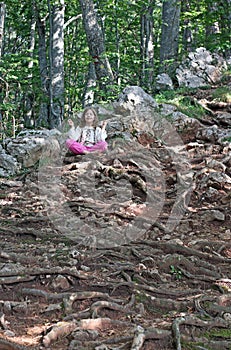 Little girl meditating