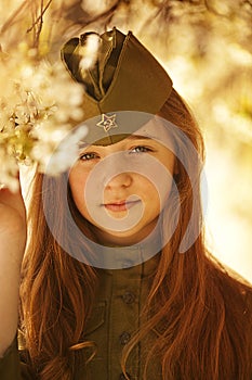 Little girl in a military uniform