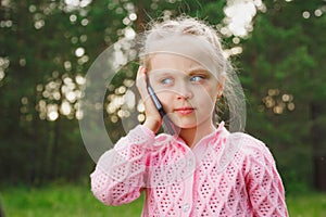 Little girl with mobile phone