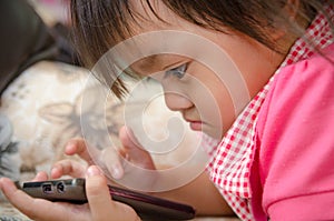 Little girl with mobile phone