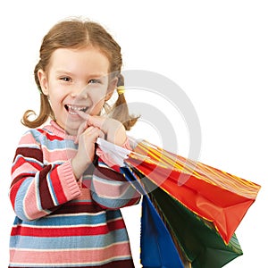 Little girl with multi-colored packages