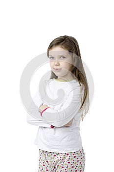 Little girl in nightwear on white photo