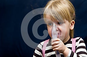 Girl with inhalator