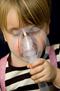 Girl with inhalator