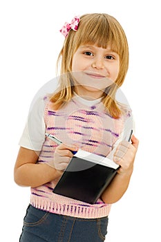 Little girl with notebook