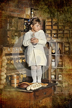 Dievčatko na starej kuchyni