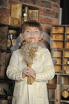 Little girl on the old kitchen