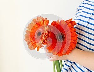Little girl with orange flowers